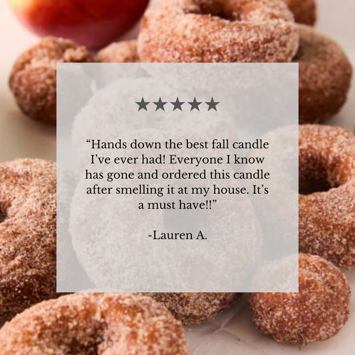 A product review card featuring a five-star rating and a quote by Lauren A., overlaid on a background photo of sugar-coated donuts.